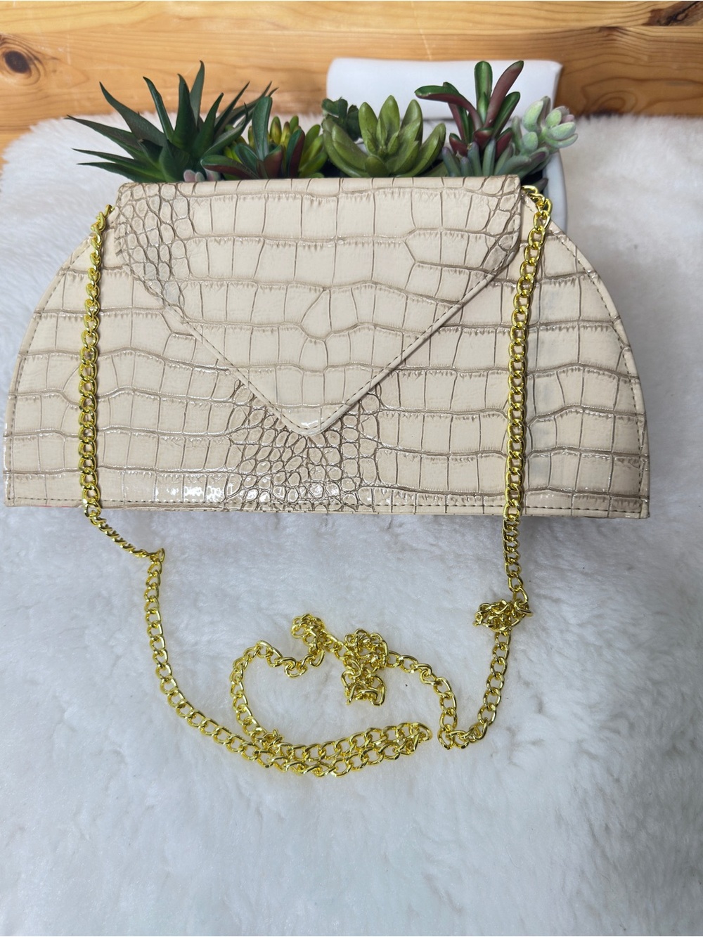 Croc-embossed envelope clutch or crossbody bag by Joy & Iman.